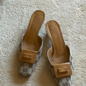 Gucci GG canvas flat slides
